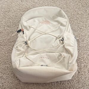 The North Face Jester Backpack in Cream with Rose-Gold Logo